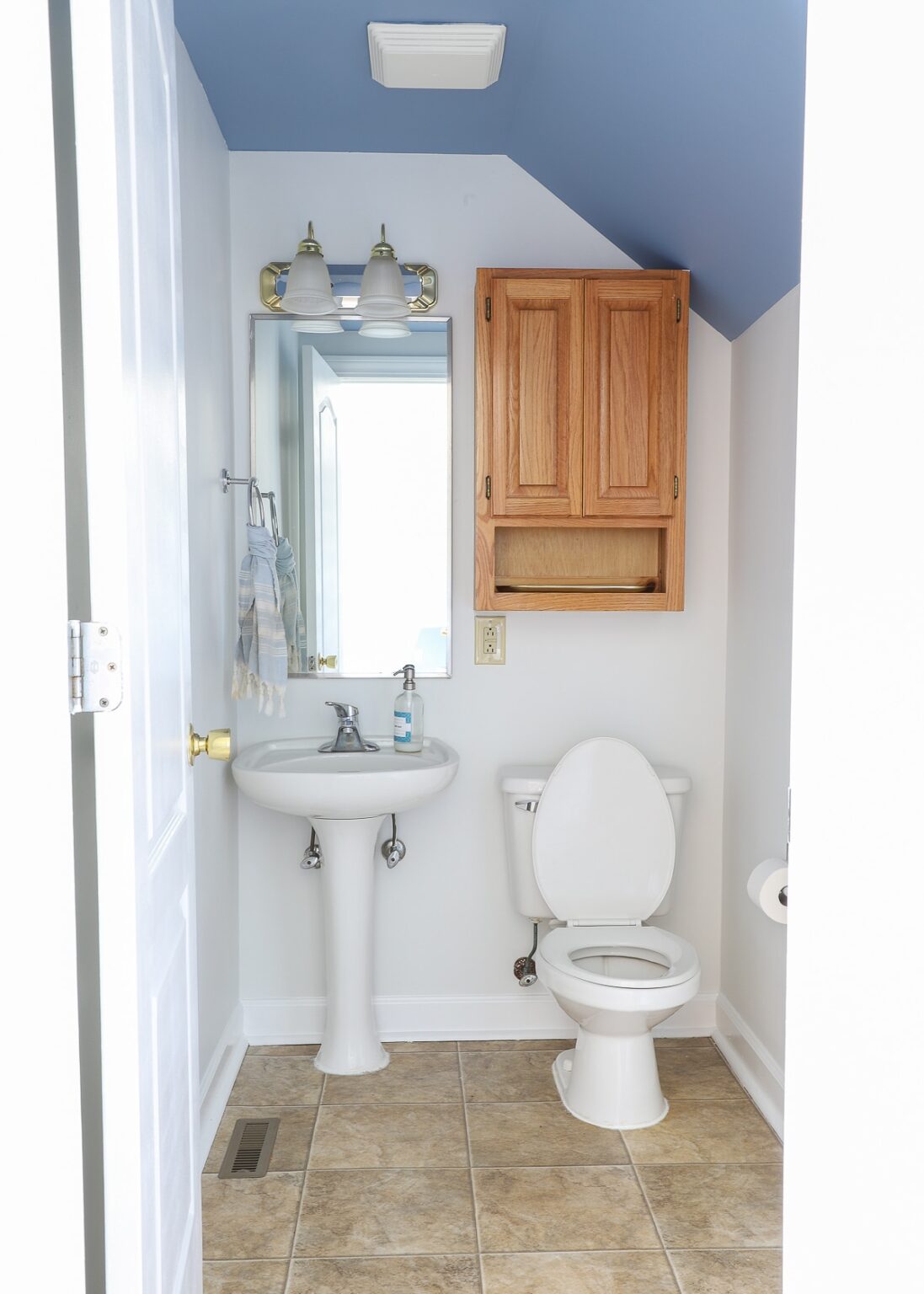 How to Cover Ugly Rental Bathroom Floors with a Vinyl Mat The Homes I