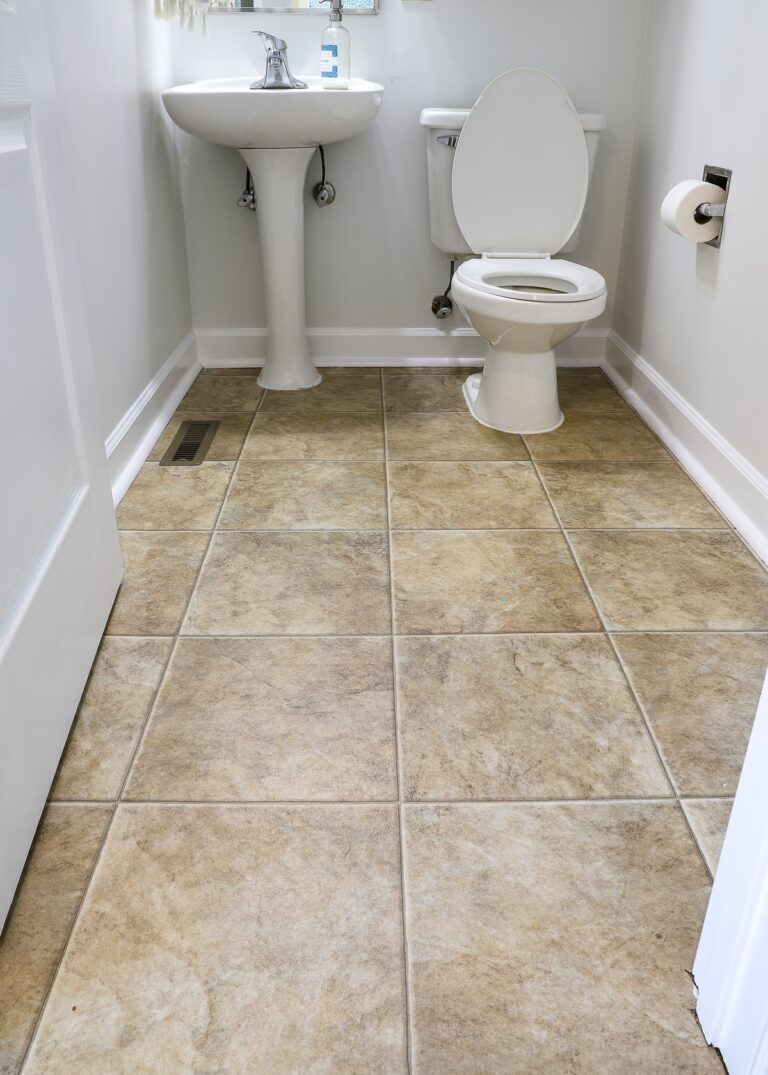 How to Cover Ugly Rental Bathroom Floors with a Vinyl Mat The Homes I