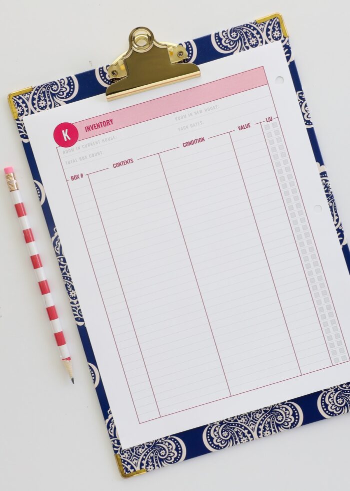 Printable Moving Inventory in pink on a blue clipboard