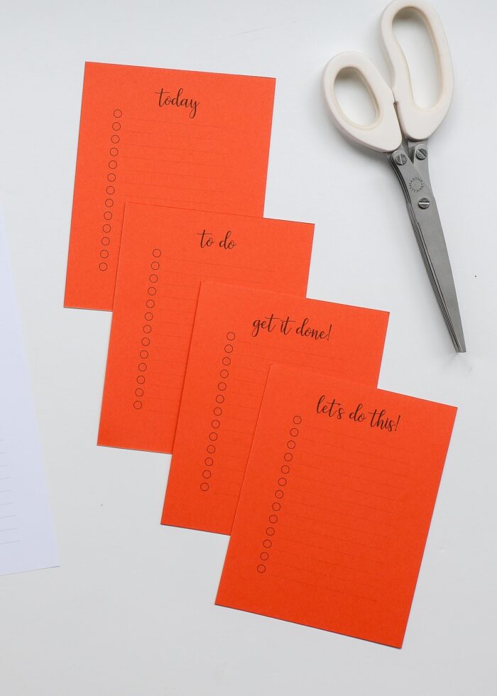 Mini printable to do lists printed onto orange paper