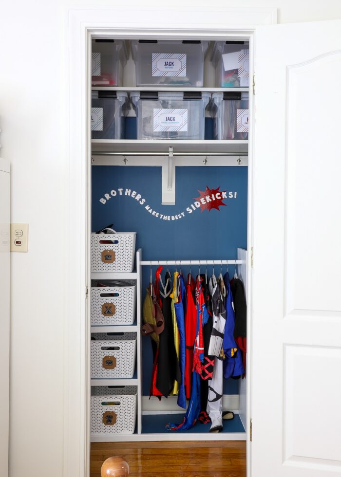 Organized dress up station setup inside a kids bedroom closet