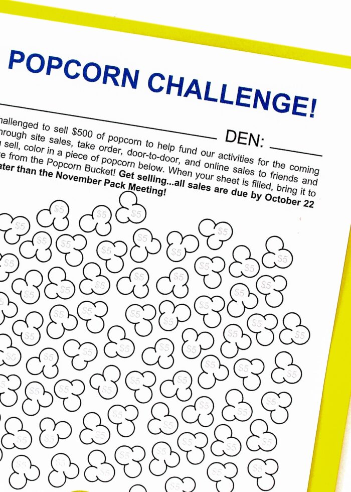 Printable Cub Scout Popcorn Tracker on top of yellow folder