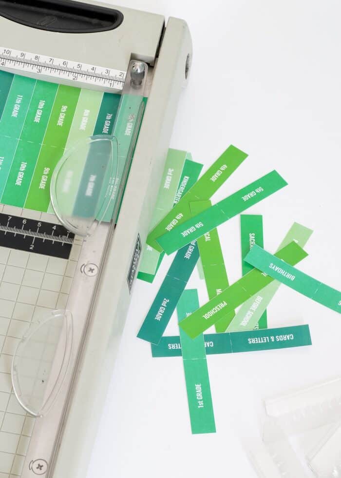Memory box tab labels cut apart with paper trimmer