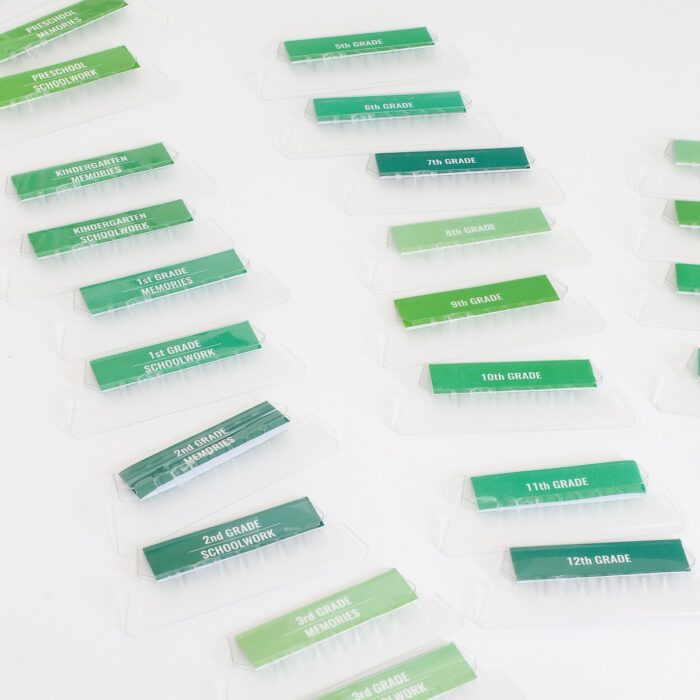 Green file tabs for a school memory box