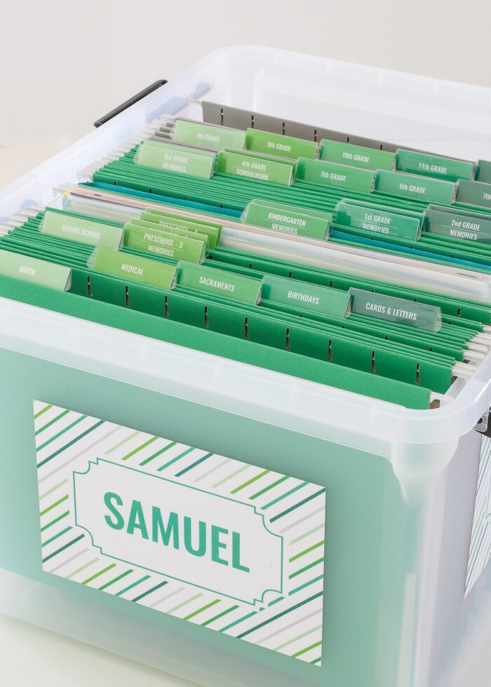 School memory box with green file folders and grade-by-grade tabs