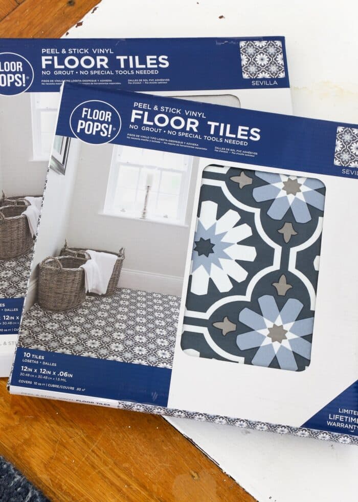 Two boxes of blue-and-white Floor Pops Floor Tiles