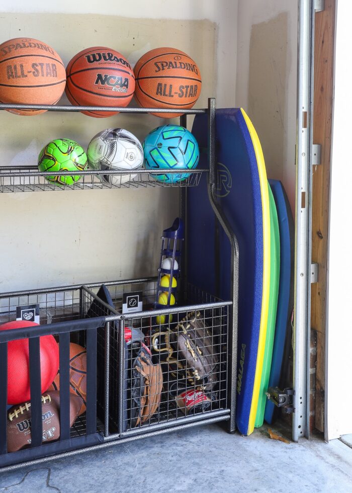 Boogie boards tucked into the corner of a garage