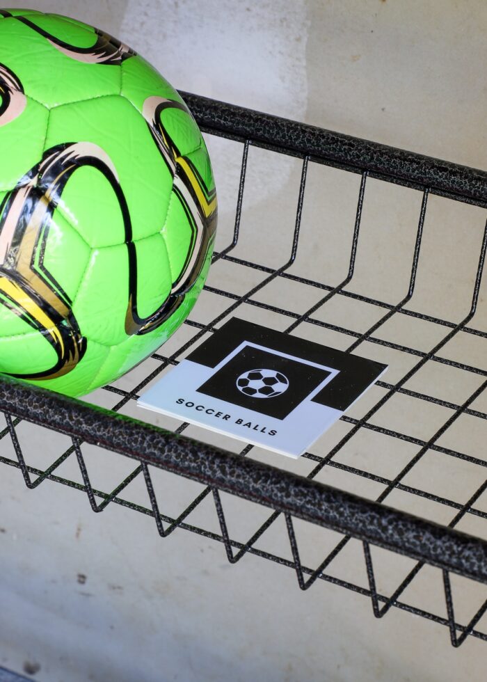 Soccer Balls label on a sports equipment rack