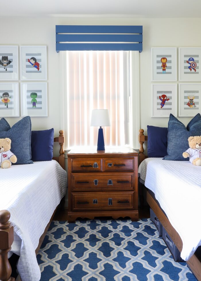 Blue and white child room with blue wooden valance on the window