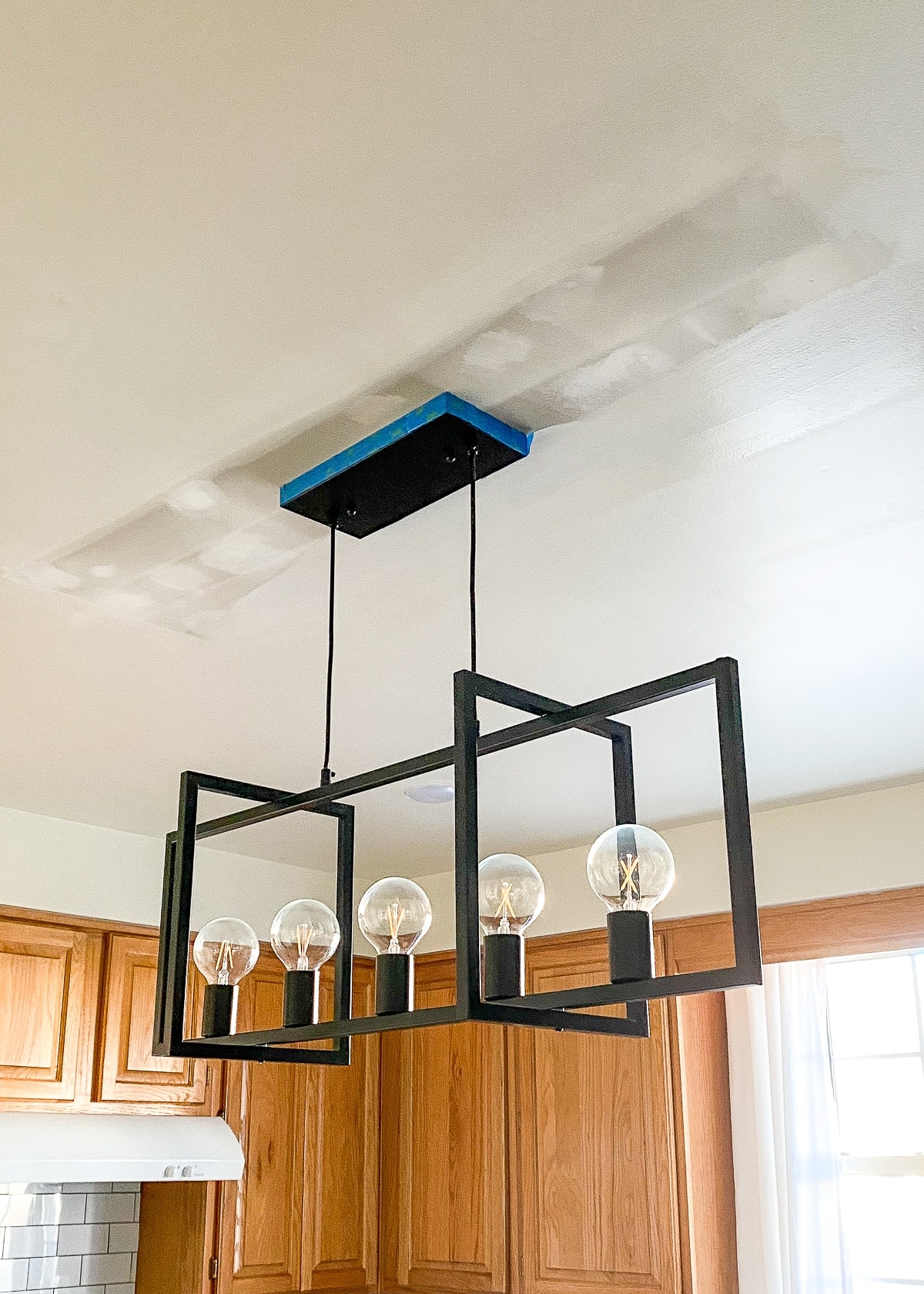 What You Need To Know About Changing Light Fixtures In Your Rental
