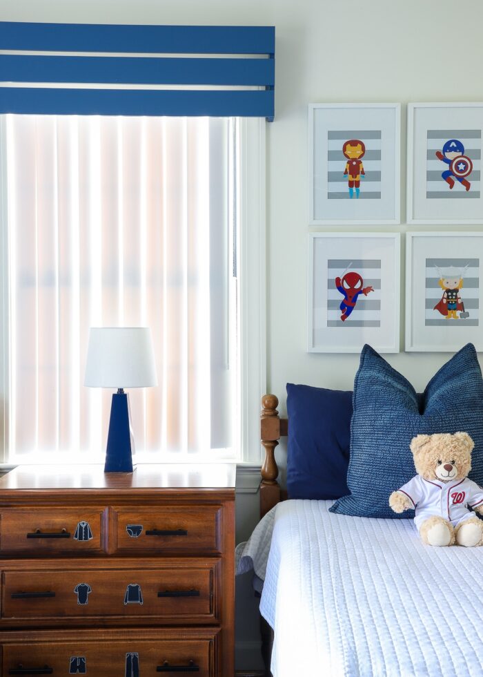 Blue slat wooden valance hung on kids' bedroom window