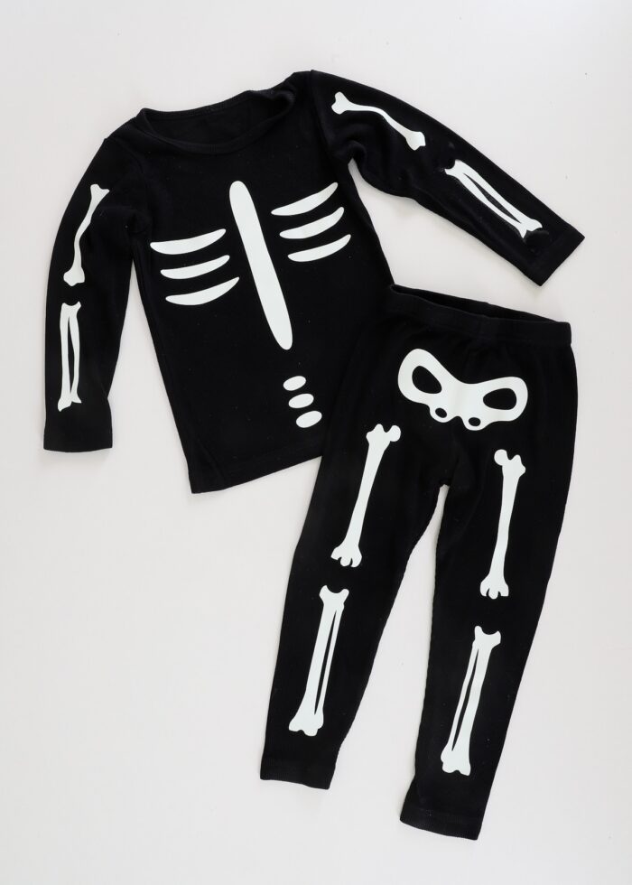 Simple DIY skeleton costume made from iron-on vinyl and a black sweatsuit