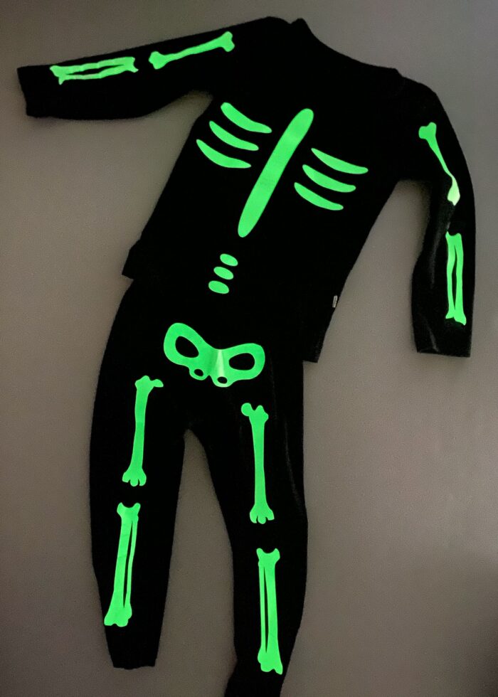 Black sweatsuit with glow-in-the-dark bones ironed on to create a skeleton costume