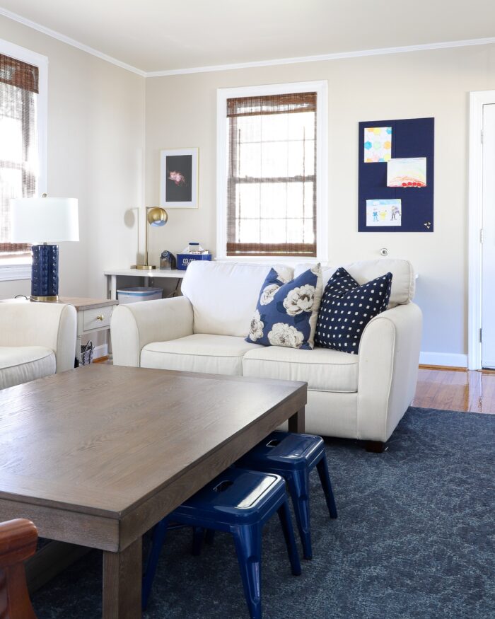 Blue and white family room with brown accents