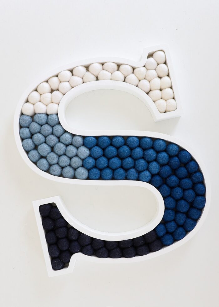 Pom Pom Letter S made with blue and white felt balls