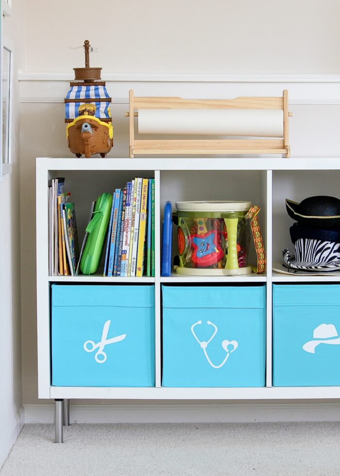 Kallax shelves in playroom lifted up on furniture feet
