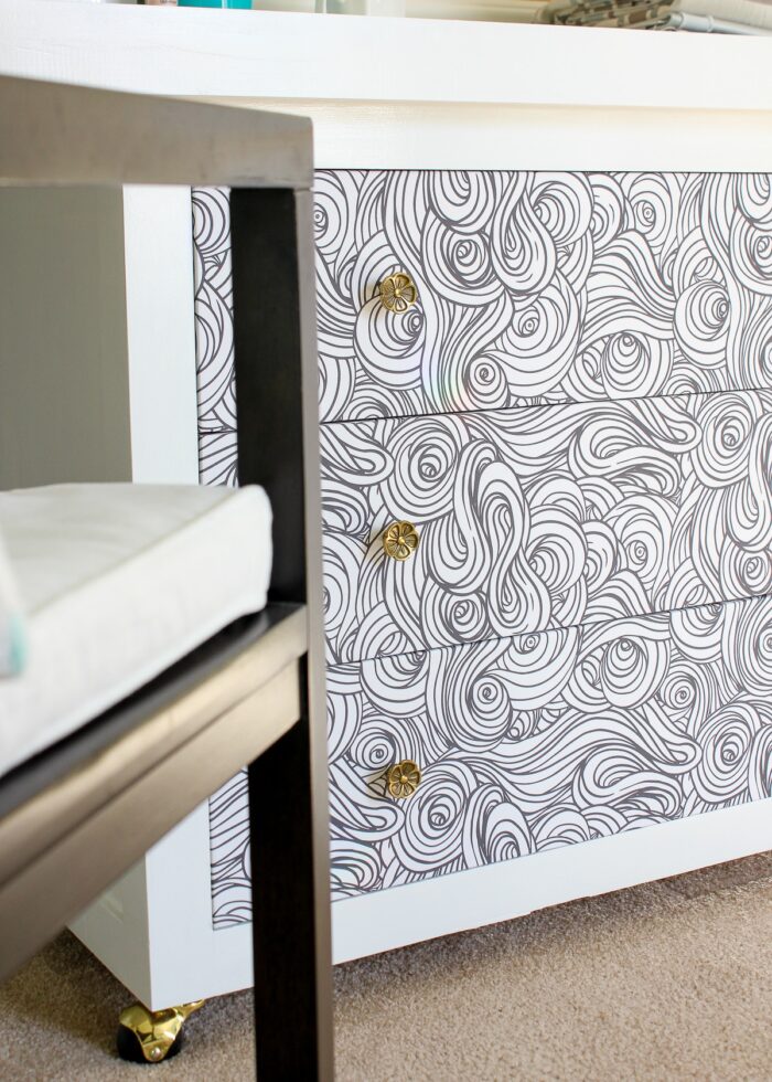 Dresser drawer with wallpapered drawers