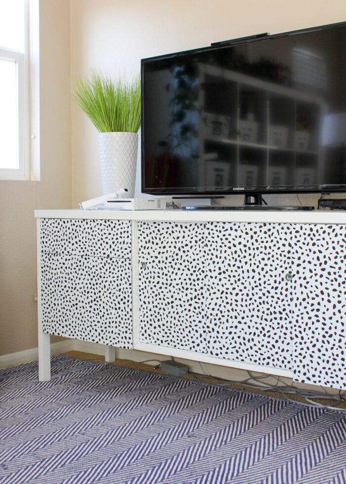 Credenza with wallpapered doors and drawers