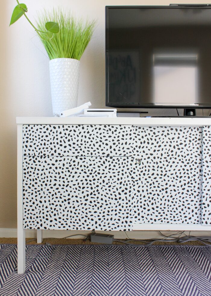 Credenza with wallpapered doors and drawers