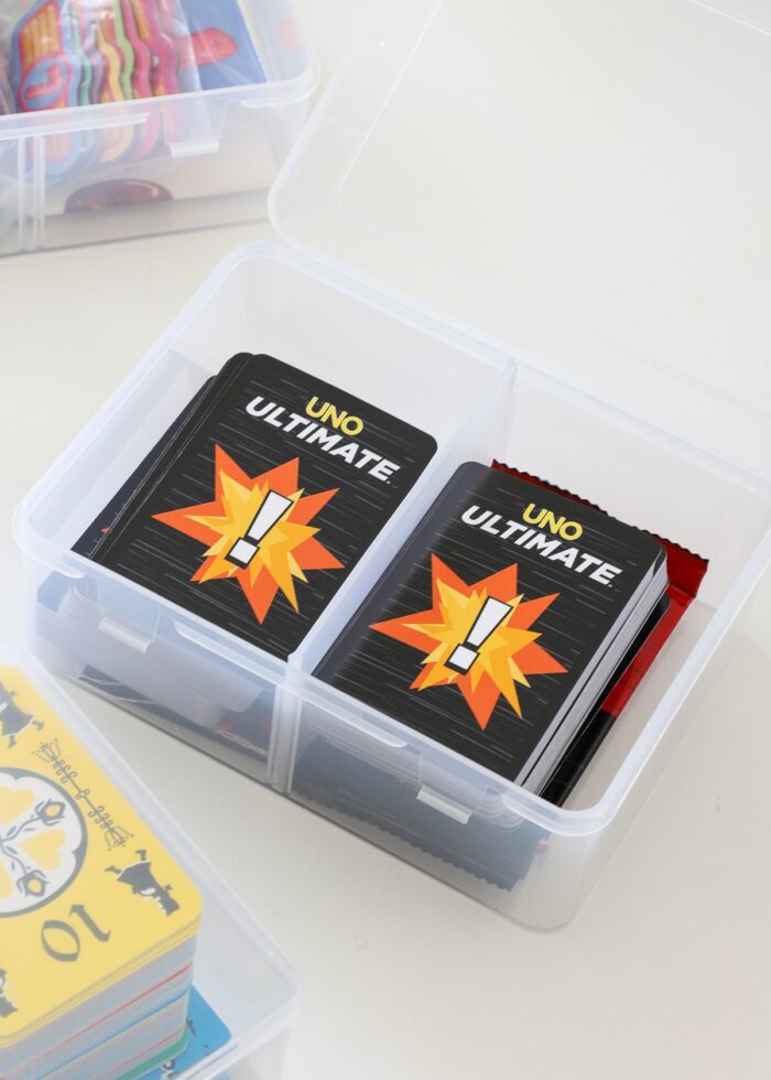 Ultimate Uno card game loaded into clear plastic card box