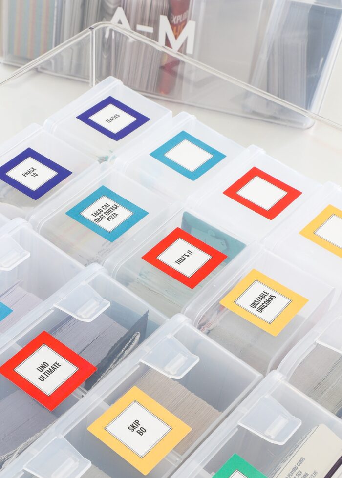 Playing card cases with bright colored labels