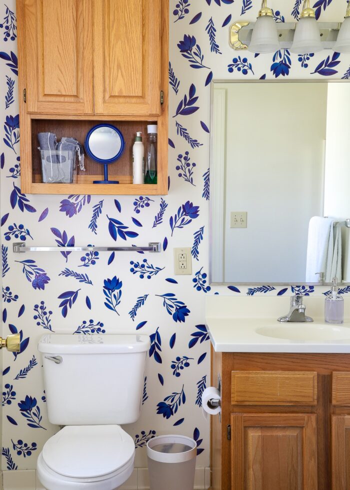 Rental bathroom decorated with blue flower bathroom wall decals