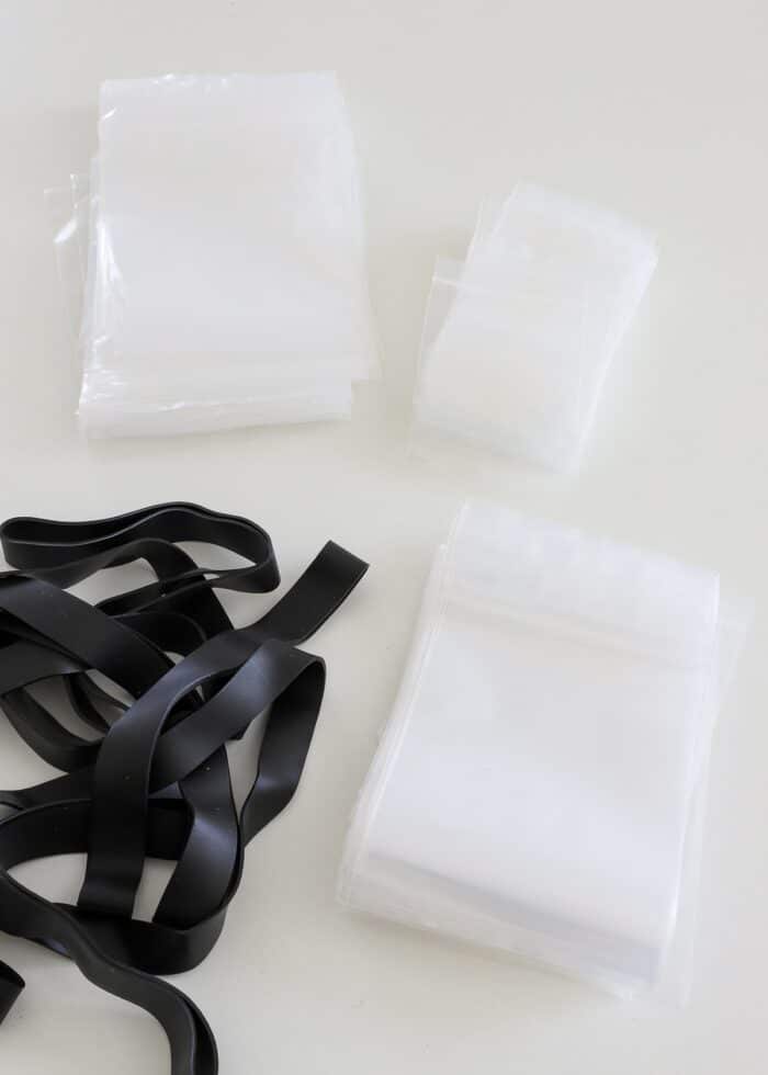 Small plastic bags and large black rubber bands
