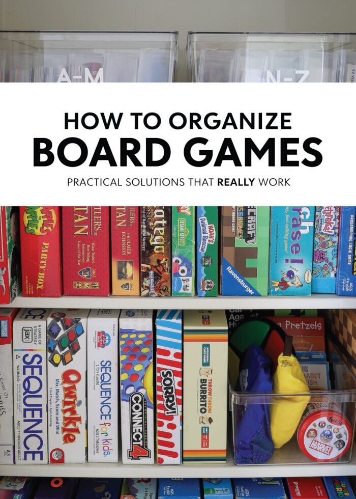 Organized game closet with board games standing on their sides