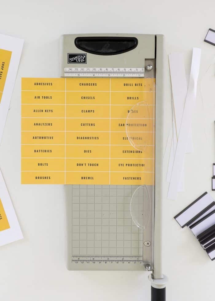 Paper trimmer shown cutting down printable toolbox labels