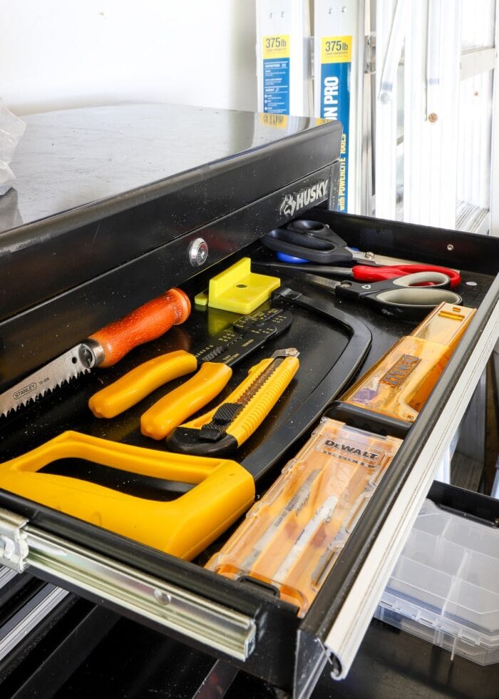 Black Husky toolbox with Dewalt tools inside