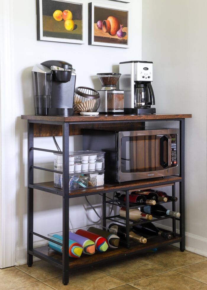 A coffee station setup in a corner nook of a rental kitchen