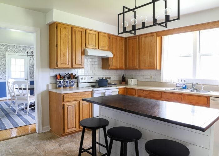 An oak rental kitchen filled with over a dozen renter friendly upgrades