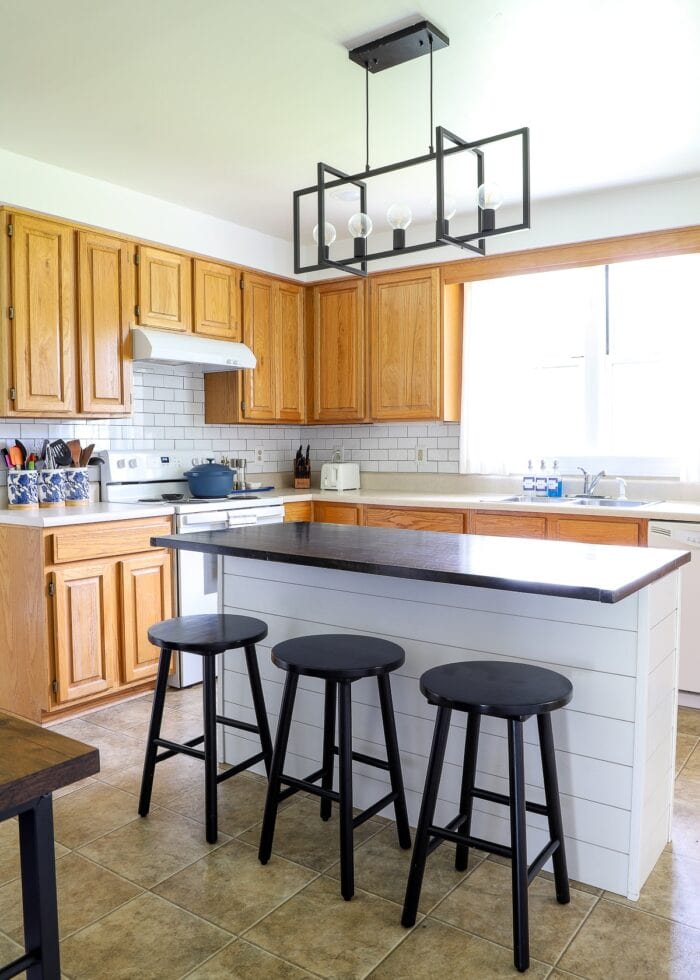 An oak rental kitchen filled with over a dozen renter friendly upgrades