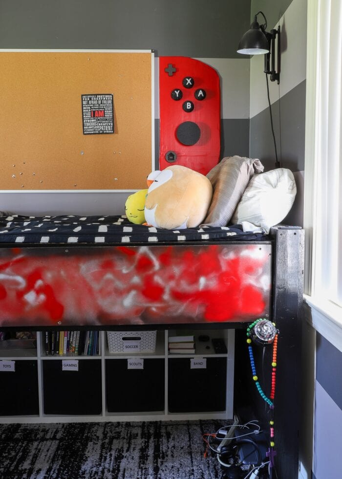 IKEA Kallax cube shelves tucked underneath a loft bed