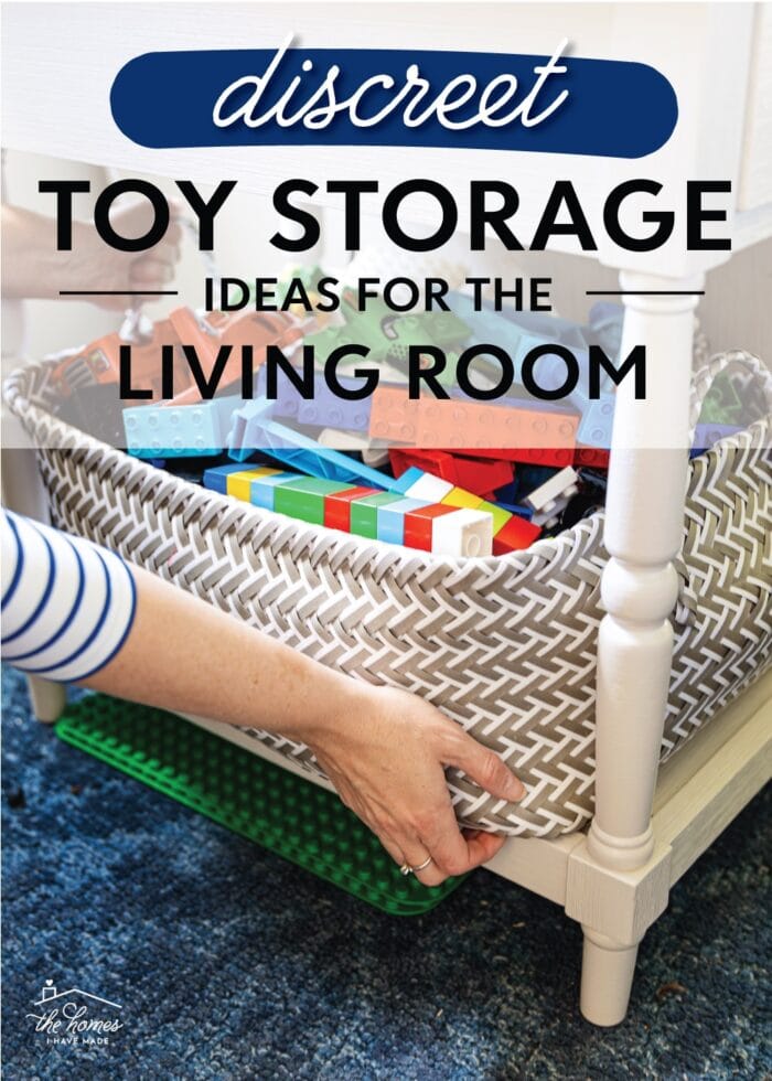 Hands placing a basket of Duplo blocks under a side table