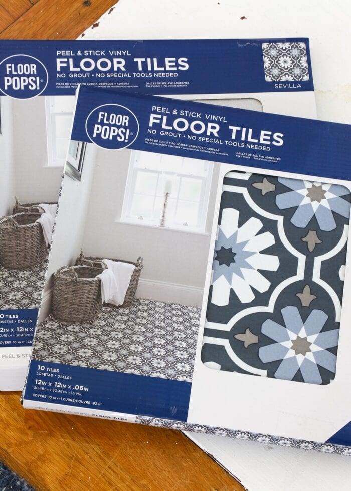 Two boxes of Floor Pops! Floor Tiles on a white surface