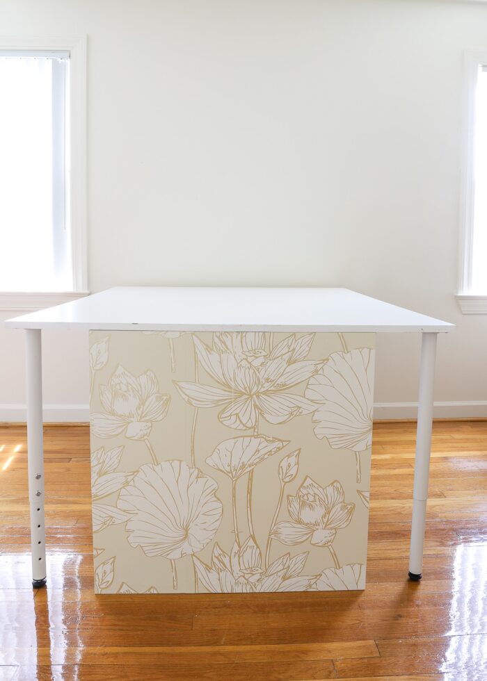 Huge craft table in the middle of an open craft room