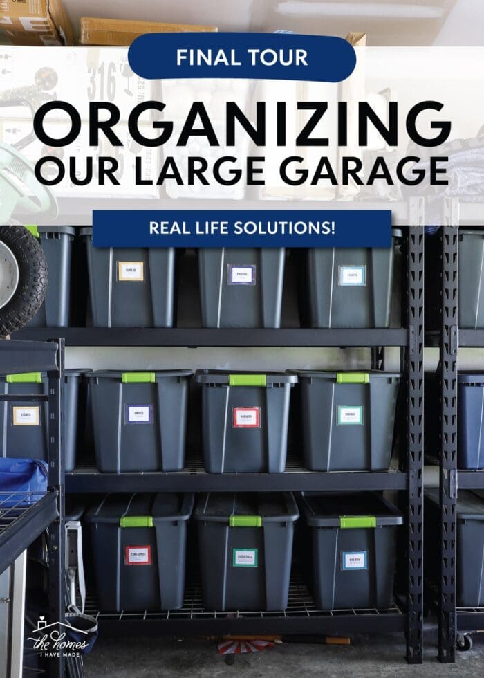 Matching storage totes with colorful labels on tall garage shelves
