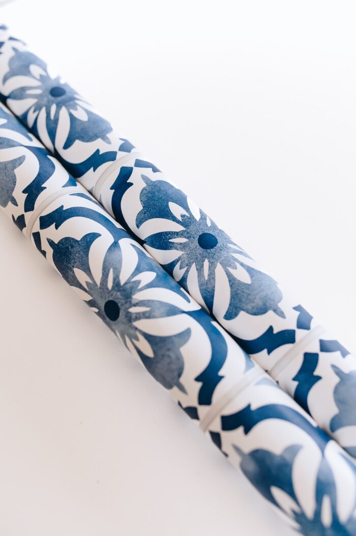 An up-close shot of blue and white tile wallpaper