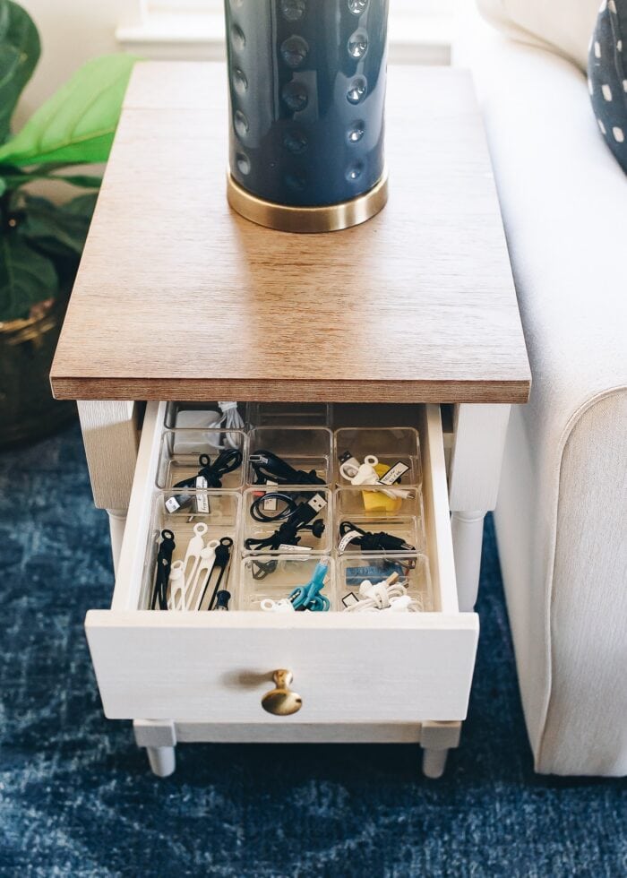 Labeled and organized cords organized in a side table drawer