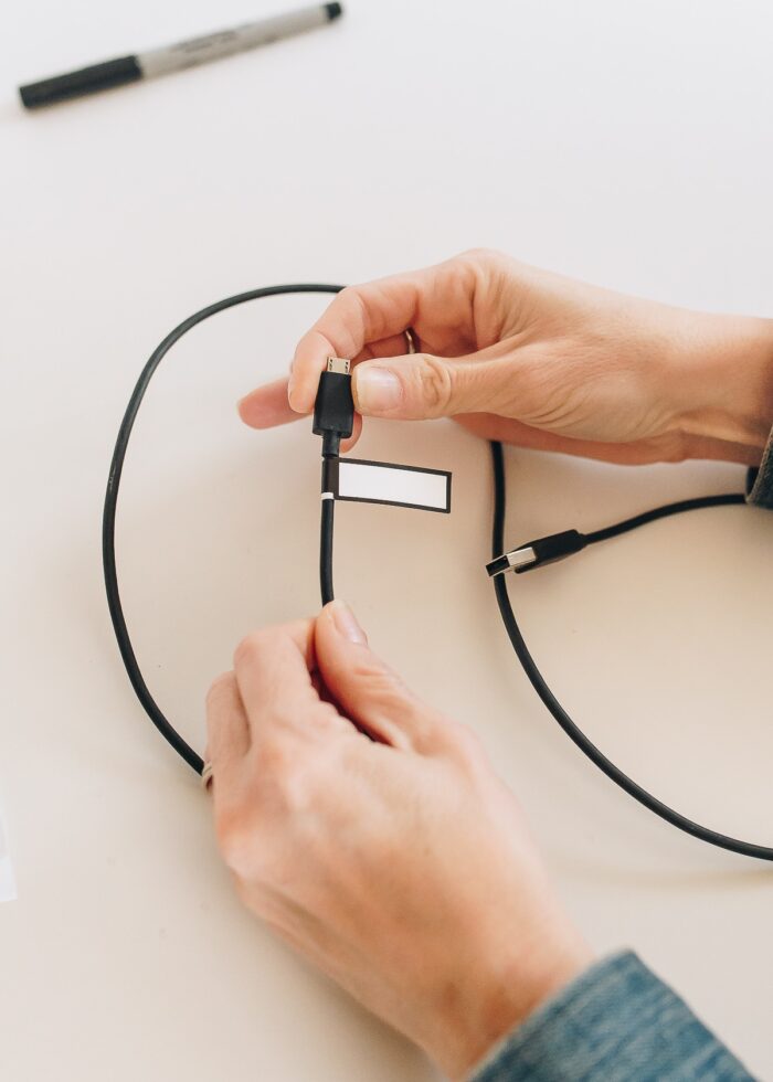 A writable cord label on the end of the cord