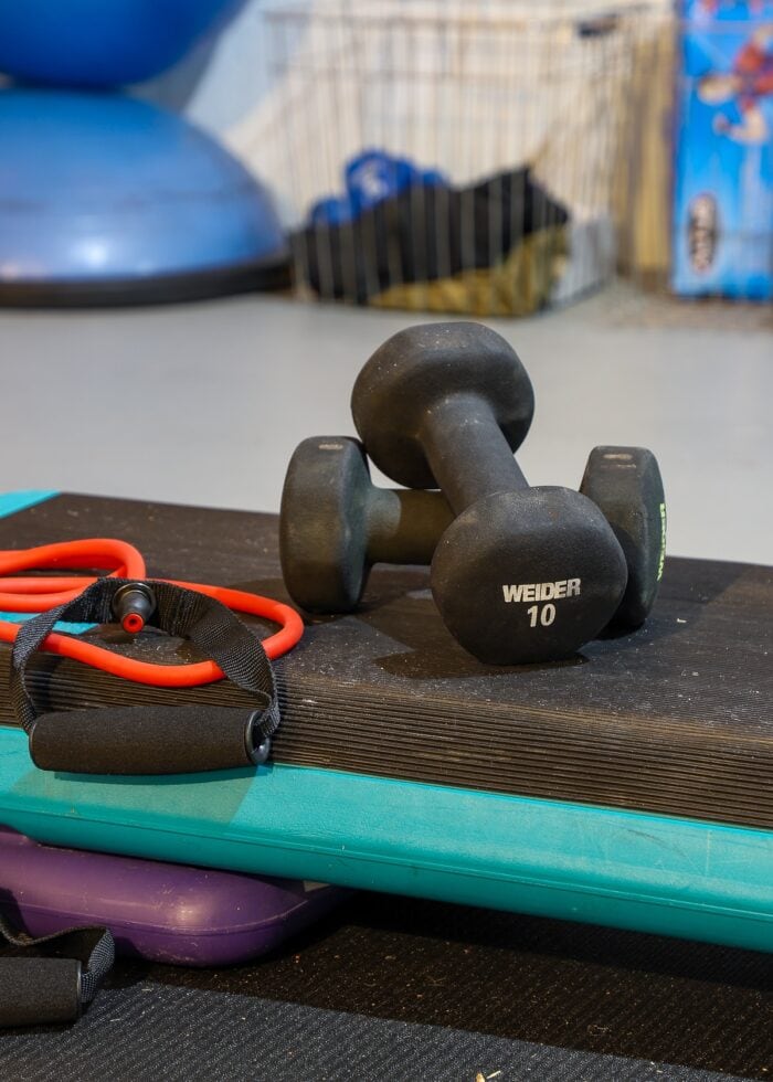 Weights and an exercise band on a STEP