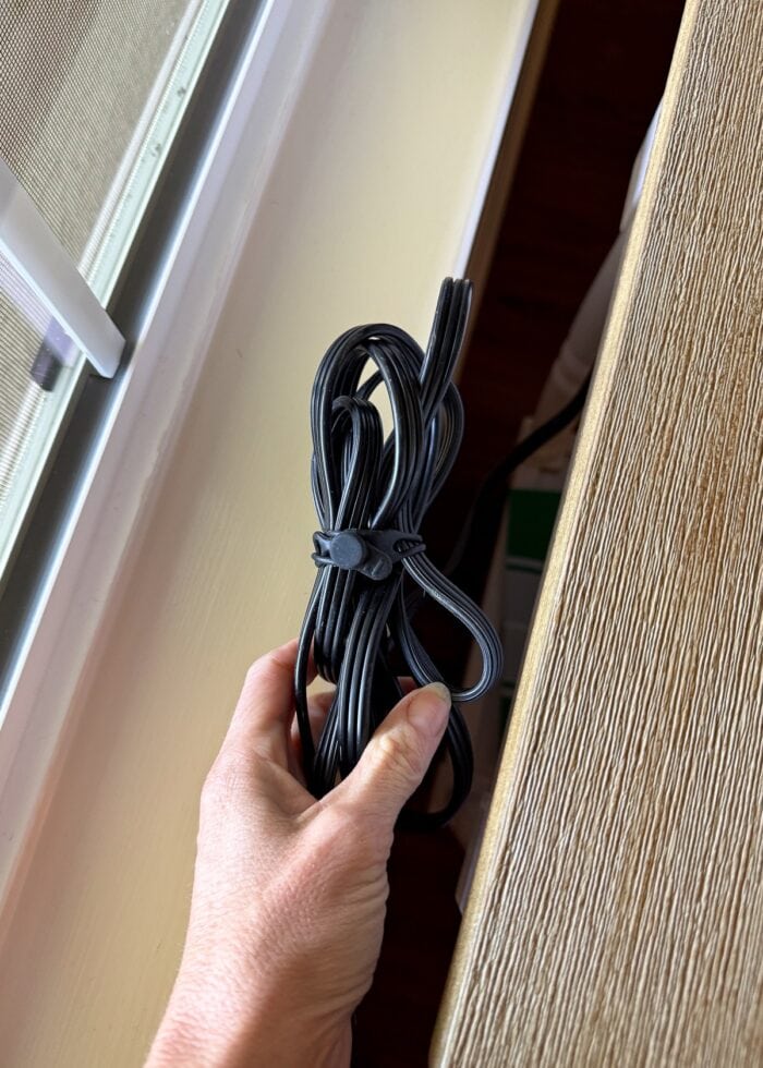 Bundled cords behind a table