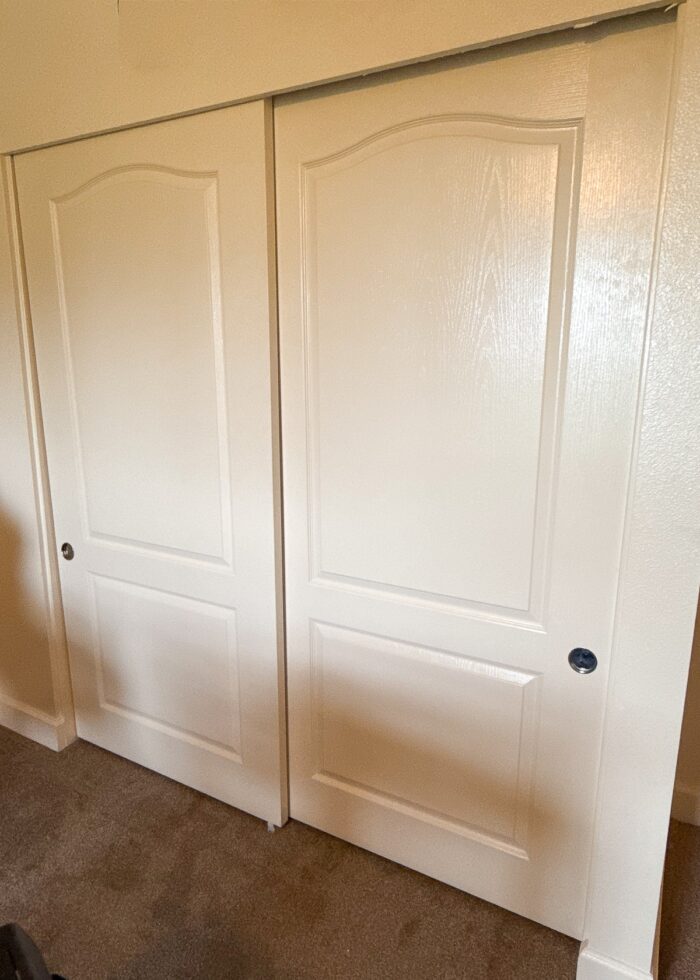 Sliding doors covering a closet