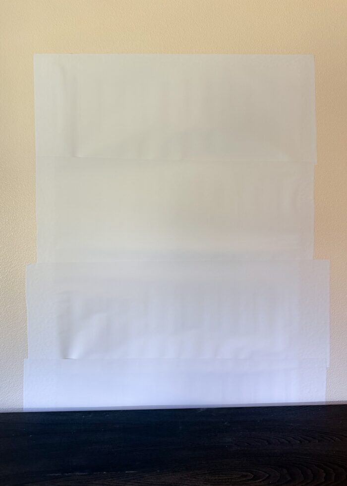 A wallpaper patch covering up a window