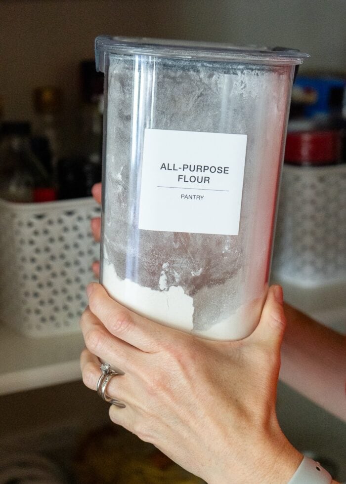 An up-close shot of a single Rubbermaid Brilliance Pantry Canisters holding all purpose flour.