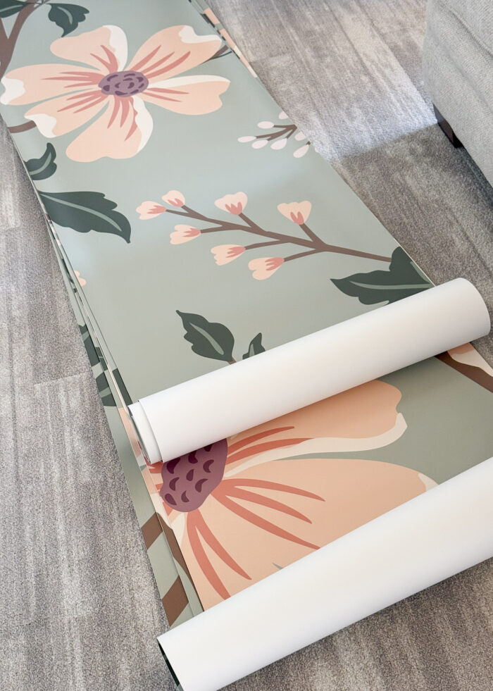 Wallpaper panels as part of a large mural laid out on the floor