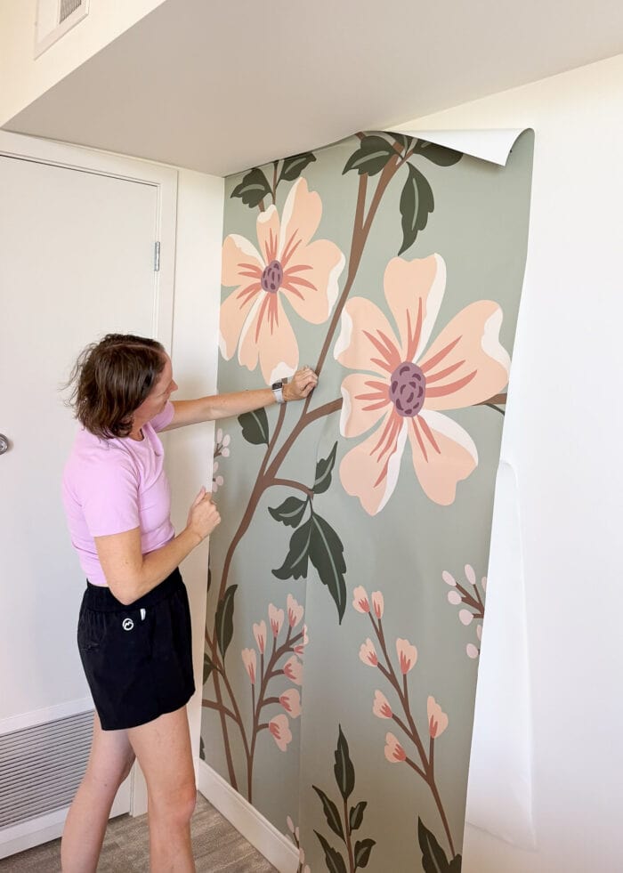 Megan from The Homes I Have Made matching wallpaper panels of a large floral mural